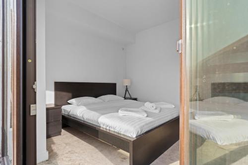 Ένα ή περισσότερα κρεβάτια σε δωμάτιο στο Ultra Central Apartment - Victory Avenue