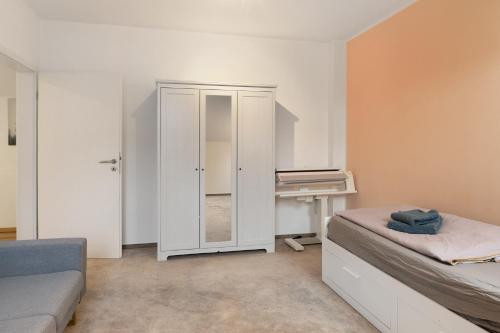Katil atau katil-katil dalam bilik di Modernes Appartement 100m2