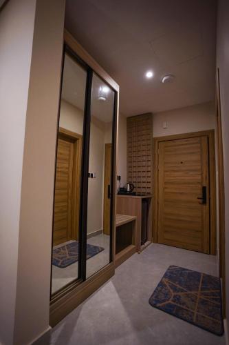 Кровать или кровати в номере سي قل للشقق المخدومة - seagull apartment service