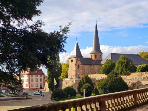 an old building with two towers and a church at Quartier 2 in Fulda