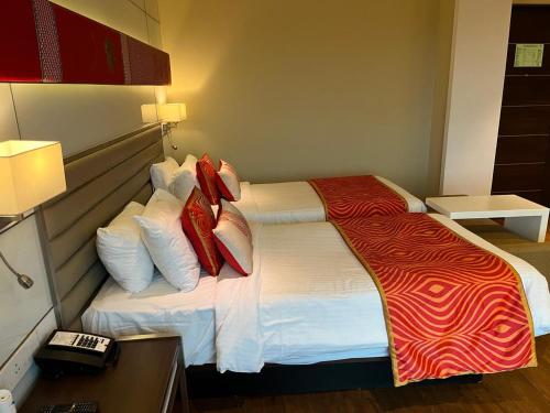 Postel nebo postele na pokoji v ubytování Fortune Park, Vellore - Member ITC Hotels' Group