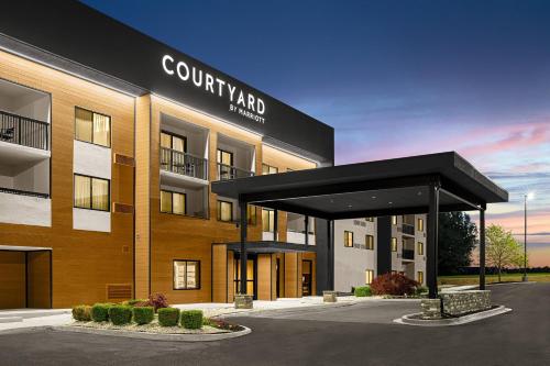 a rendering of a building with a pavilion in front of it at Courtyard Paducah West in Paducah