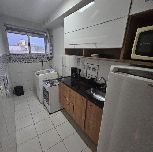 Kuchyň nebo kuchyňský kout v ubytování Minha Praia