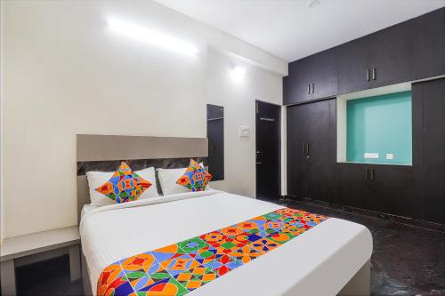 Ένα ή περισσότερα κρεβάτια σε δωμάτιο στο Fabhotel Vista Park - Near to cognizant TCO office
