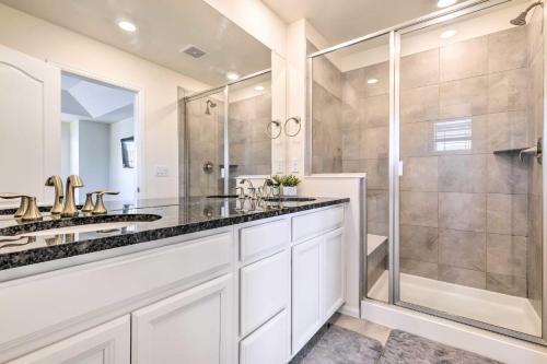 a bathroom with two sinks and a shower at Charming 3BR Retreat - Perfect for Families! in Fort Collins