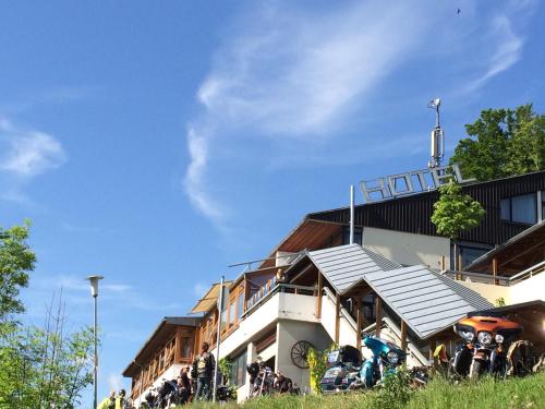 a group of motorcycles parked outside of a building at Akzent Hotel Höhenblick in Mühlhausen im Täle