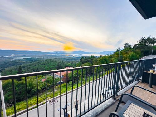 a view from the balcony of a house at Bayview Hills Luxury Residences in Tivat