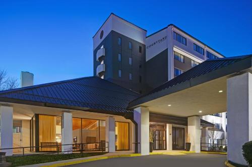 a rendering of the front of a building at Courtyard Chicago Elmhurst/Oakbrook Area in Elmhurst