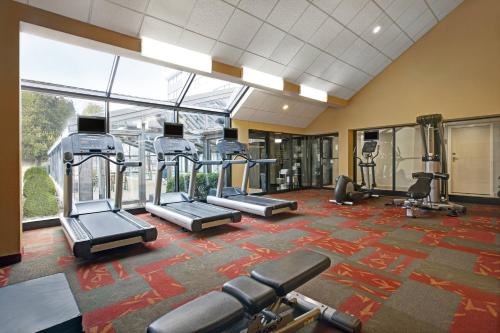 a gym with treadmills and ellipticals in a building at Courtyard Chicago Elmhurst/Oakbrook Area in Elmhurst
