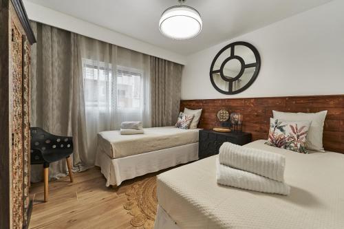 Postel nebo postele na pokoji v ubytování Albacora Apartment