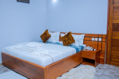Ein Bett oder Betten in einem Zimmer der Unterkunft Hotel Rolax