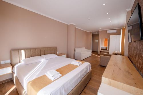 TV a/nebo společenská místnost v ubytování Lider Hotel