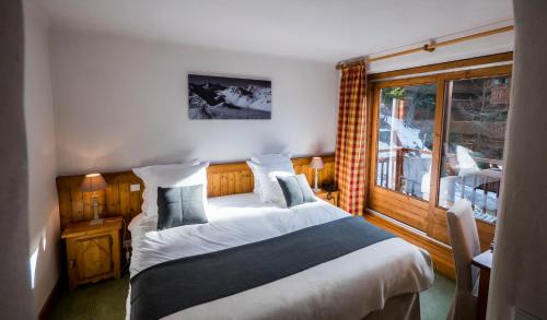Postel nebo postele na pokoji v ubytování Hotel & Spa Merilys