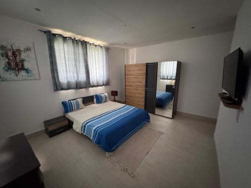 Ένα ή περισσότερα κρεβάτια σε δωμάτιο στο Apartment with sea view