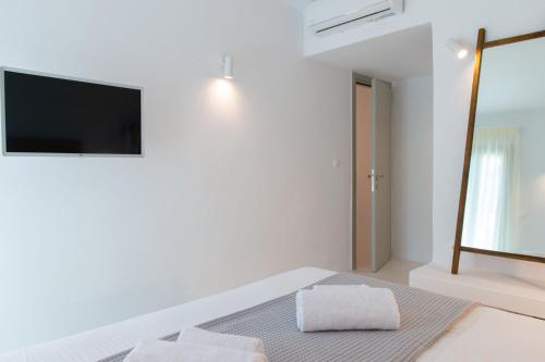Postel nebo postele na pokoji v ubytování Miele Residences