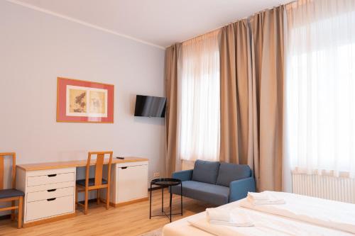 Televisyen dan/atau pusat hiburan di Aparthotel in Leipzig - Vollausgestattete Apartments