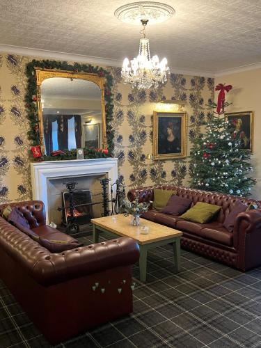 Ein Sitzbereich in der Unterkunft The Royal George Hotel