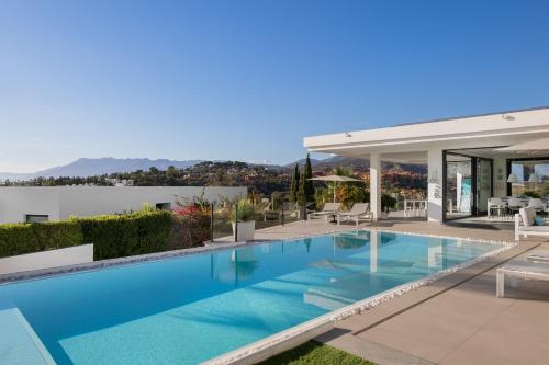 Modern 4BR Villa with Pool & Sea Views