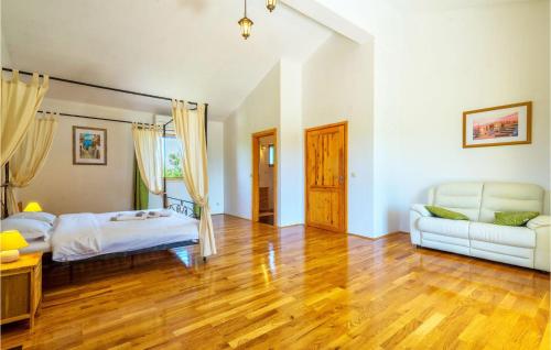 Ένα ή περισσότερα κρεβάτια σε δωμάτιο στο Villa Paradiso
