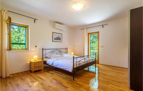 Ένα ή περισσότερα κρεβάτια σε δωμάτιο στο Villa Paradiso