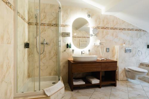 Koupelna v ubytování Hotel Horal