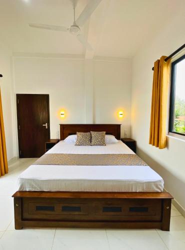 Katil atau katil-katil dalam bilik di AYA Sea View Hotel