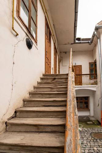 a staircase leading up to a building at Altius Studio 2 in Braşov