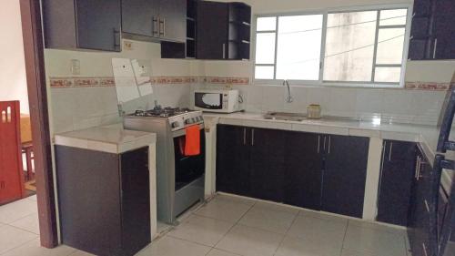 Кухня или мини-кухня в Casa Estrella Santa Rosa
