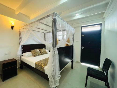 Katil atau katil-katil dalam bilik di AYA Sea View Hotel