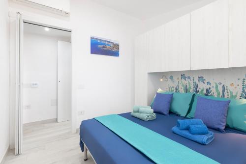 En eller flere senge i et værelse på Casa FriDe