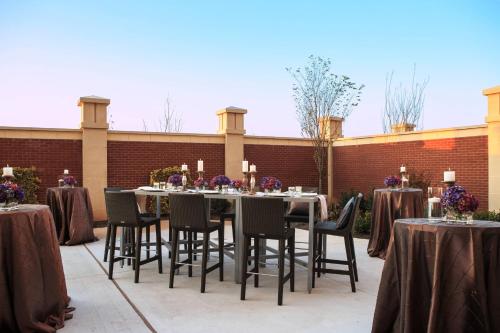 a table set up for a dinner party on a patio at Courtyard by Marriott Philadelphia Lansdale in Lansdale