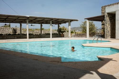 Bazén v ubytování Rancho MM nebo v jeho okolí