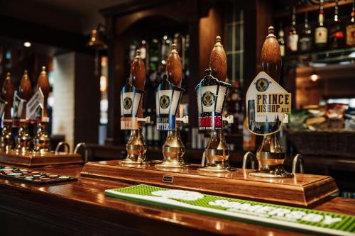 a bar with bottles of beer on a counter at The Keelman in Newcastle upon Tyne