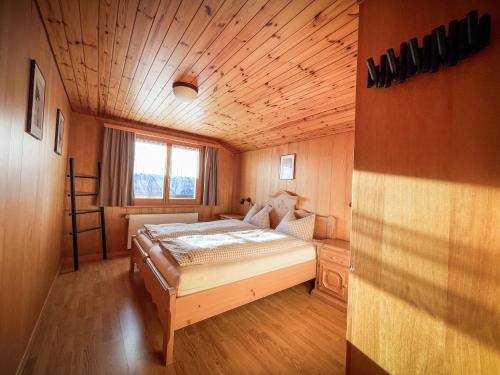 Postel nebo postele na pokoji v ubytování Chalet Talblick
