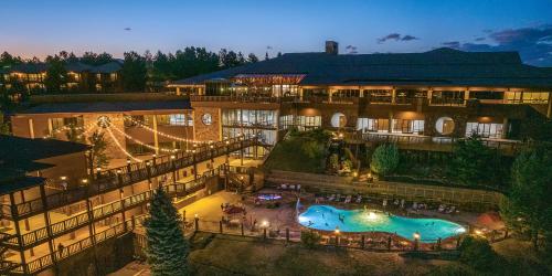 an aerial view of a hotel with a swimming pool at Cheyenne Mountain Resort, a Destination by Hyatt Hotels in Colorado Springs