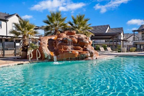 a water slide in a swimming pool at 30-31| 2 Homes in St George with Private Pools and Hot Tubs in Santa Clara