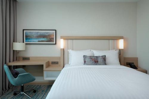 Postel nebo postele na pokoji v ubytování Courtyard by Marriott Chisinau