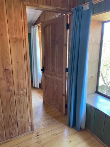 a room with a door and a window at Espacio Ecole in Pucón