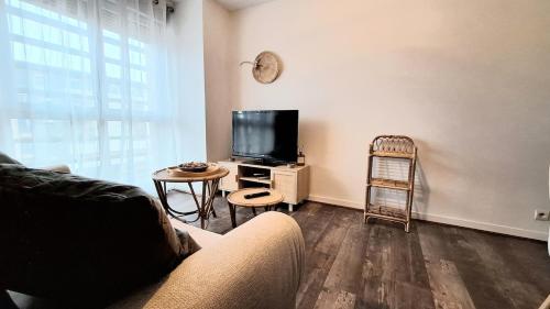 Appartement cosy, balcon et place privée