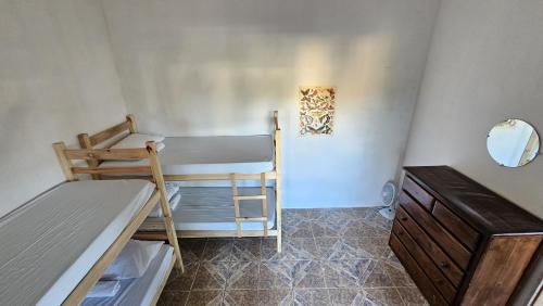 Postel nebo postele na pokoji v ubytování LahSelva Pousada e Hostel