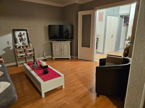 Μια τηλεόραση ή/και κέντρο ψυχαγωγίας στο Appartement avec balcon à Metz, 82 m², 4 personnes