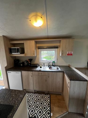 Η κουζίνα ή μικρή κουζίνα στο Caravan Holiday Home