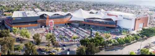 an aerial view of a building with a parking lot at SaVilie 1 - Seguridad y Comfort in Guadalajara