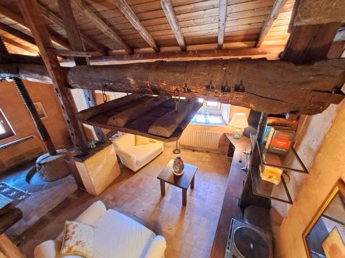 an overhead view of a living room with white furniture at Dimora Migliori in Viagrande