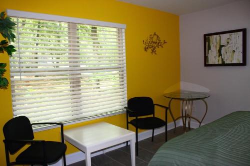 Una cama o camas en una habitación de Southern Elegance Gateway