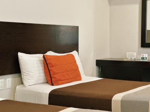 Postel nebo postele na pokoji v ubytování Hotel Mayis