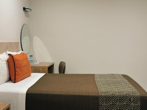 Postel nebo postele na pokoji v ubytování Hotel Mayis
