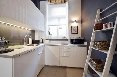 Una cocina o zona de cocina en Cocoma-Design-Apartment Deluxe - very central