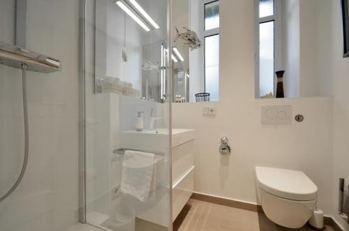 Ένα μπάνιο στο Cocoma-Design-Apartment Deluxe - very central