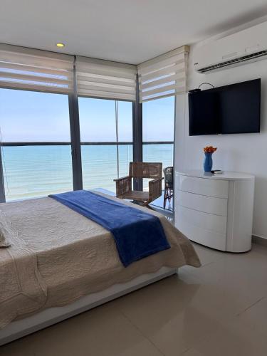 MC 1303- beach front apt- Morros City top location